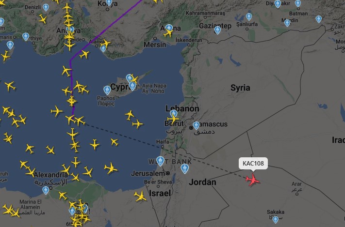 Iran - Israel War - Page 5 - News, Politics & Economics - PistonHeads UK - The image shows a map with numerous flights marked on it. The map appears to be of the Middle East and North Africa region, given the names of countries like Syria, Israel, Iraq, Jordan, and parts of Turkey and Egypt. Each flight is represented by a line or arrow, indicating the direction of travel. The time of each flight varies, suggesting different routes and schedules. There's also a smaller map within the main one showing another part of the world with more flights marked on it. The overall image gives an impression of a busy air traffic control center.