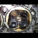 What causes a burnt or broken valve? - Page 1 - Engines & Drivetrain - PistonHeads - The image depicts a close-up view of the rear of a soccer goal post. The post appears to be a single piece made from metal, with each corner securing a net between them. There are several small vents visible on the side of the post, suggesting a weighted base to prevent it from moving easily. The post is located on a soccer field with the goal lines clearly visible in the background. There are a couple of other objects visible at the bottom corners of the image, but it's not clear what they are. The overall scene is of a standard soccer field, captured from a high angle.