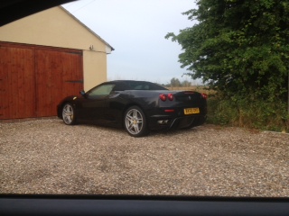 A car parked in front of a house - Pistonheads