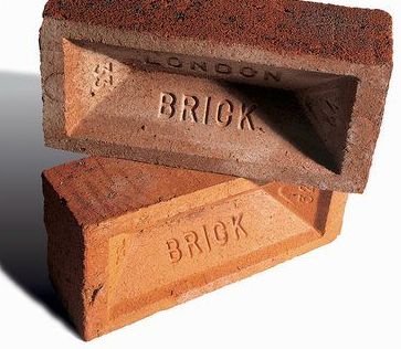 Hyperactive Dog Required Pistonheads Advice - The image showcases two bricks, sitting on a flat surface. They appear to be freshly molded, with a reddish-brown color that enhances their distinct brick shape. One of the bricks has the word "BRICK" inscribed into it in bold, uppercase letters, indicating the brand or type of the brick. The positioning of the bricks, stacked one on top of the other, and the clear, uncluttered background emphasize the bricks as the central focus of the image. The image does not contain any people or provide any context about the location or occasion. It's a simple yet effective representation of two bricks.