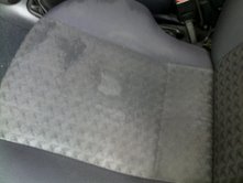 Puma - my first P&J - Page 1 - Readers' Cars - PistonHeads - The image shows a close-up view of what appears to be a car's interior. Specifically, the focus is on a cushioned surface, likely a part of the car's upholstery or door trim. This surface is coated in a white, textured substance, which could be foam or a protective material. The substance is fully covering the surface, extending beyond the visible edges of the interior piece. The texture of the material suggests it may be heat-resistant, potentially to protect the car's interior from heat-related damage. The overall appearance is a blend of industrial and decorative car design.