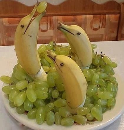 A bunch of bananas that are sitting on a table
