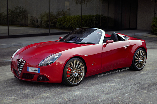 A red and black car with a basket on top - Pistonheads - The image showcases a vibrant red Alfa Romeo Giulietta EV boost electric sports car on a city street. Its sleek design is accentuated by gold-rimmed wheels and black interior. The car features a sunroof and a retractable rear window, adding to its modern style. The surrounding environment is a typical urban scene with buildings in the background. The photograph is taken in a way that the car takes center stage, capturing the allure and elegance of this electric vehicle.