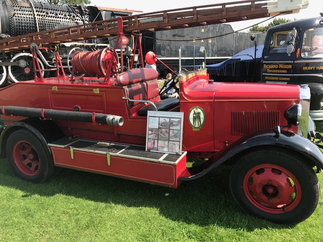 A red fire truck parked in a field - Pistonheads