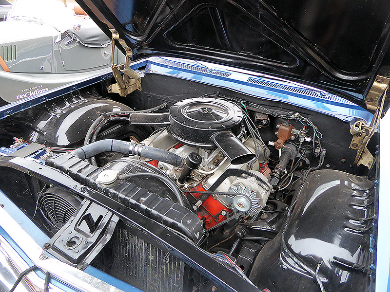 Pistonheads - The image shows the underside of a vintage car, with various mechanical components visible. There is a prominent engine with an assortment of hoses and belts, and other parts such as the exhaust system and suspension. The photo appears to have been taken up close, possibly to document the state of the vehicle or to showcase its interior for maintenance purposes.