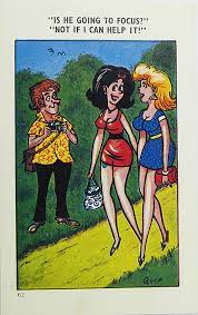 Sean Connery Joke Thread (Vol 10ish) - Page 437 - The Lounge - PistonHeads UK - The image shows a comic strip featuring three characters. The central figure is a man in a blue suit, standing between two women; the woman on his left is blonde and wearing a short dress, while the one on his right has brown hair and is also dressed in a short dress. The man appears to be looking at them with a neutral expression. Above this scene, there's a text bubble that says, "Is he going to focus? Not if I can help it." This suggests an ongoing conversation or a potential interaction between the characters. Below the comic strip, there is a small figure of a woman in a red dress and a man in a blue suit, standing together, which could indicate their relationship or affiliation. The overall style of the image is reminiscent of traditional newspaper comic strips.