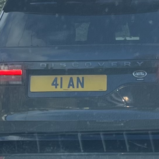 Real Good Number Plates Vol. 6 - Page 665 - General Gassing - PistonHeads UK - The image shows a car with a license plate that reads "41 AN" parked on the side of a road. The vehicle appears to be a modern, possibly electric or hybrid SUV given its design and the badge on the back indicating "Discovery." The sky is visible in the background, suggesting an outdoor setting. The perspective suggests the viewer is standing behind the car looking at it from the front side. There's no text overlaying the image.