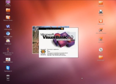 From WinXP to Ubuntu - Page 1 - Computers, Gadgets & Stuff - PistonHeads - The image displays a computer desktop with the Microsoft Visual Basic 6 application open. The VB6 icon is prominently featured on the desktop, indicating that the program is currently open. The desktop background is a gradient of warm colors, with a soft orange blending into a darkened purple edge. Surrounding the VB6 icon are several shortcuts or icons to various programs and files, suggesting a Windows operating system used here. The interface appears to be that of Windows XP, characterized by a user-friendly and recognizable layout.