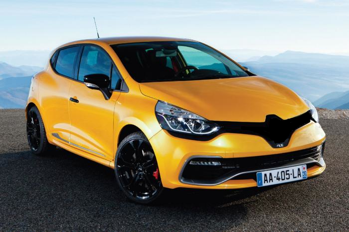 A car that is parked on the side of the road - Pistonheads - The image is a studio photograph of a bright orange hatchback car, which appears to be a sports or performance model. This compact car has black rims and a unique front grille with a distinctive design. There are clear markings on the windshield and possibly the body, but no text is visible. The background is a blurred sky with mountains in the distance, suggesting the setting for a photo shoot. The car is positioned in profile, with a slight angle, displaying its aerodynamic body contours and angled headlight fixtures. The lighting in the photograph highlights the car's reflective surfaces and smooth design, conveying a sense of modernity and dynamism.