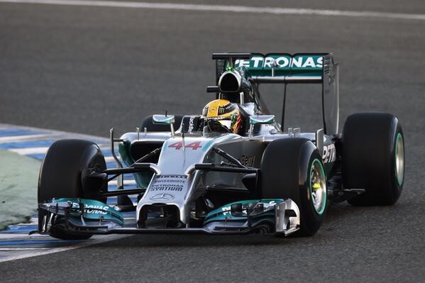 A couple of motorcycles parked next to each other - Pistonheads - The image captures a dynamic scene on a Formula 1 track. A front three-quarters view of a Formula 1 car taking a sharp corner on a race track. The car is silver and black in color, with a prominent number on the side, possibly indicating its driver or the car's identity. The tires show a mix of blue and white markings, which is typical for F1 cars. The car's aerodynamic design is evident in the bodywork, with small details like rear wing and front airdam contributing to its aerodynamic performance.