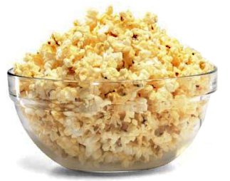 Man Speaking Pistonheads Arabic - The image features a large glass bowl with a flared top, filled to the brim with hundreds of light yellow popcorn kernels. The bowl is placed on a plain white surface, highlighting its contents without any distractions. The texture of the popcorn kernels is grainy and homogeneous, indicating they're all the same size and shape. The angle of the image is slightly above the bowl, allowing a clear view of the popcorn kernels inside. The popcorn is dry and looks ready to be cooked.