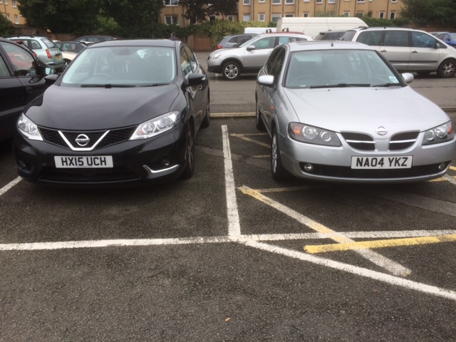 A couple of cars parked next to each other - Pistonheads