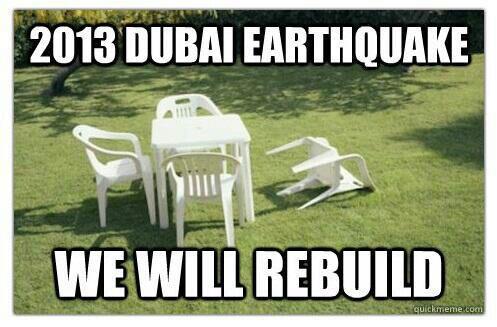 Earthquake - Page 1 - Middle East - PistonHeads - The image shows two padded lawn chairs tipped back onto the grass, suggesting a flimsy or low-quality design. The chairs are circular in shape and appear to be made of a lightweight material, possibly plastic or a similar synthetic. A black and white caption superimposed on the image reads "2013 Dubai earthquake WE WILL REBUILD," indicating a humorous or ironic commentary on the city's response to the event. The caption is centered and the text is large and bold, contrasting with the lighter tone of the scene.