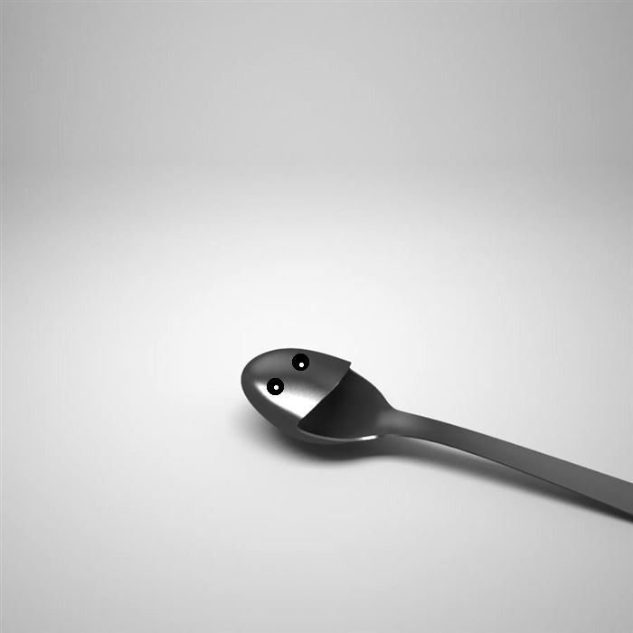 New Teaspoon Advice Please - Page 107 - The Lounge - PistonHeads - The image shows a stainless steel ladle leaning at an angle against a white background. The utensil has a hollow handle with two small round cutouts at the end and an engagement ring on top of it. The ladle's design is modern and sleek, with a simple and functional aesthetic. The white background contrasts with the metal, highlighting the ladle's features.