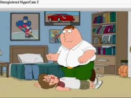 Facebook Pistonheads Fails - The image is a humorous cartoon featuring two characters in a domestic setting. The more prominent character is depicted as a stein with brown fur, wearing a white shirt and dark trousers with a belt, standing slightly over the other. The second character, who is smaller, is placed on the floor with one hand touching the first character's leg and seems to be in a state of unconsciousness. Their hair is brown and they are wearing a plain white shirt and dark pants, with their arms sprawled behind them. Both characters are illustrated in a clear and stylized manner with a vivid color scheme, indicative of the style used in Family Guy. In the background, there is a framed sports painting on the wall and domestic furniture like a bed and a chair, suggesting a home environment.