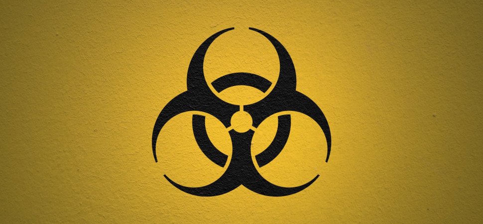 A close up of a street sign with a sky background - The image features a graphic with a yellow background. In the center, there is a white symbol resembling a biohazard sign, which is composed of three concentric circles connected by lines. This hazard sign is often associated with biological safety. To the right of this symbol, there is a watermark or logo that appears to be that of an airline, indicating that the image may be related to travel, possibly in a metaphorical sense such as avoiding a hazardous area. The rest of the image has a plain white border surrounding it.