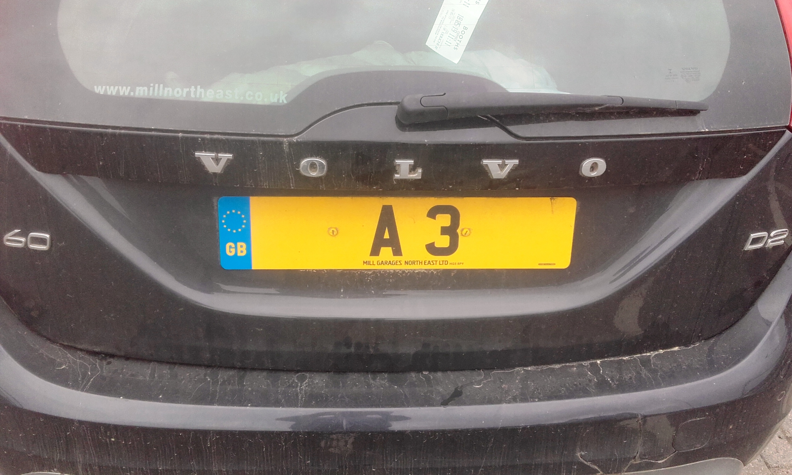 Real Good Number Plates vol 5 - Page 360 - General Gassing - PistonHeads - This image features a car with a distinctive license plate. The car is a black Volvo, identifiable by the Swedish flag on the grill. The license plate itself is notable for its unique design: it's made up of several smaller license plates, each reading "A3". This suggests that this car might be in a jurisdiction where multiple licenses are required or issued. The photo appears to have been taken from an angle slightly above the car, emphasizing the license plate as the main subject of the image.