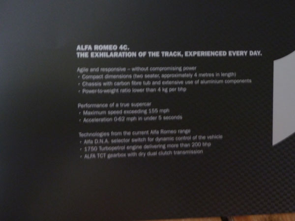 Received an Alfa 4C brochure through the post today. - Page 1 - General Gassing - PistonHeads - The image shows a brochure page for an Alfa Romeo car model. At the top, the title "Alfa Romeo 4C, the Exhilaration of the Track, experienced every day" is prominently displayed in white text on a black background. Below this, a table lists the technological features of the car, including the maximum speed, acceleration, and dynamic handling capabilities. Bullet points highlight the car's mechanical and performance aspects, such as torque split ratio, maximum speed in user mode, and maximum speed out of Turbo Charged mode, available from Alfa Romeo. The text and table layout provide a structured summary of the car's features in an appealing, concise manner.