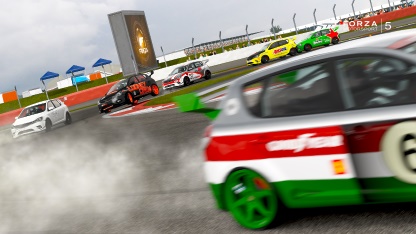 A car driving down a street next to a traffic light - Pistonheads - The image showcases a thrilling scene at a racetrack. Dominating the foreground is a white and red racing car, captured in motion at the raceway. The number 6 is prominently displayed on its side. The vehicle's speed is emphasized by the vibrant spray of smoke trailing behind it. In the background, a variety of colorful racing cars are also seen competing, adding to the dynamic and competitive atmosphere of the race. This appears to be a professional racing event, with the action-packed scene capturing the excitement and intensity of the sport.