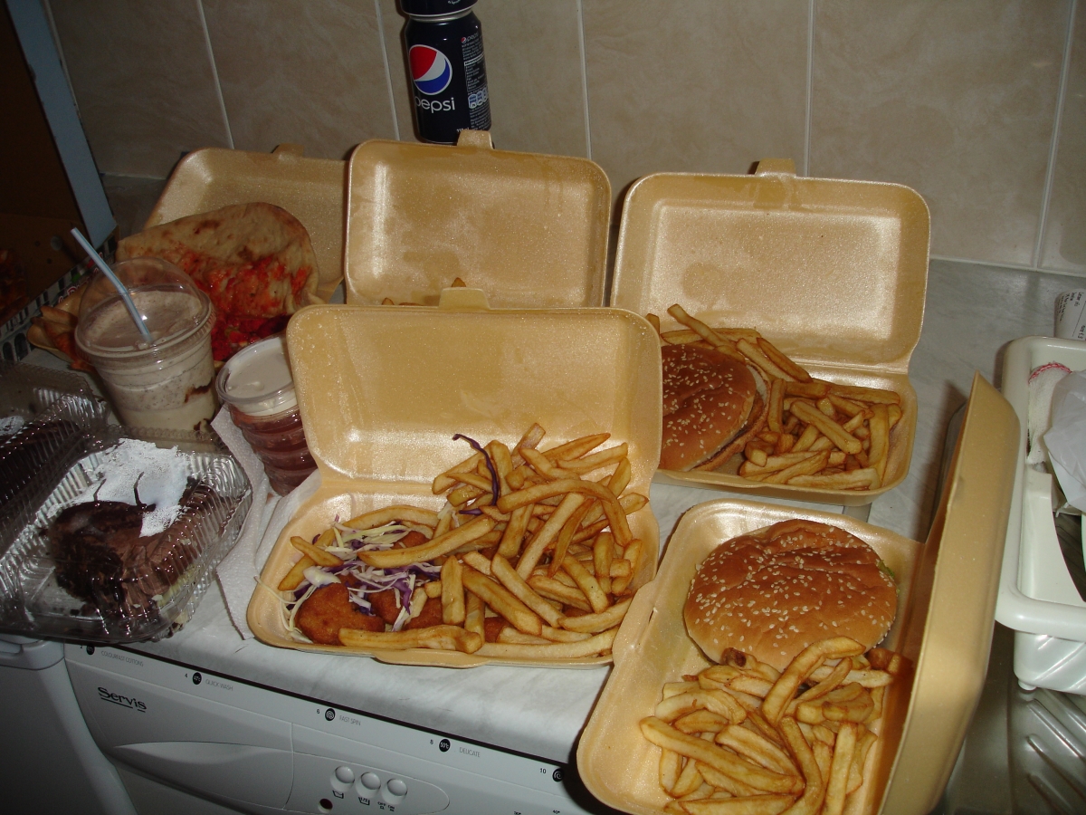 A plate of food with a sandwich and french fries - Pistonheads