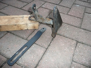 A pair of scissors sitting on top of a wooden table - Pistonheads