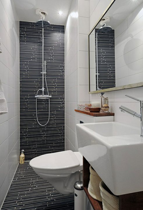A bathroom with a toilet , sink and bathtub - Pistonheads