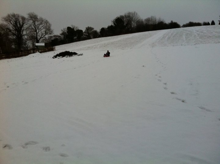 A person riding skis down a snow covered slope - Pistonheads