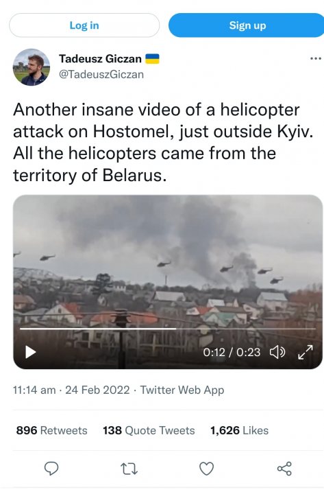 Russia/Ukraine/USA crisis. - Page 201 - News, Politics & Economics - PistonHeads UK - The image displays a screenshot of a Twitter post. It features a photo of a helicopter in the sky with smoke rising from an area below, suggesting a fire or explosion incident. Above the photo is text that reads, "Another insane video of a helicopter attack on Hostomel, just outside Kyiv. All the helicopters came from the territory of Belarus." The Twitter handle @tadeuszgizan is visible at the top of the post. The date and time stamp on the tweet are 24 February 2021 at 6:55 pm. The post has received a significant number of likes, retweets, and comments, indicating a high level of engagement with the content. The image is slightly blurry, but it conveys the message effectively.