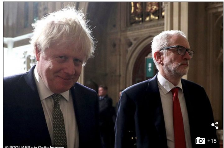 Boris Johnson- Prime Minister (Vol. 3) - Page 111 - News, Politics & Economics - PistonHeads - The image is a screenshot of a social media post showing two men standing in front of a building. The man on the left appears to be a public figure, recognizable by his distinctive hairstyle and facial features, wearing a dark suit with a patterned tie. He is smiling subtly. The man on the right, dressed in a dark suit with a white shirt, has his expression neutral. Both are walking side by side, with the building providing a backdrop to their image. There is no text visible within the screenshot. The style of the photo suggests it might be taken at an official event or meeting.