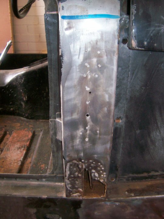 Pistonheads - The image shows the aftermath of an altercation inside a vehicle. The interior is noticeably damaged, with visible dents and scratches on panels that appear to be within close proximity to the driver and passenger seats. The exposed metal of the vehicle's structure indicates that the plastic or fabric upholstery has been removed, revealing the underlying metal frame.

The extent of the damage suggests that a significant force was used, leading to multiple punctures in the metal, creating tear marks. These holes are randomly placed along the horizontal metal bar at the bottom of the panel. This damage can be seen as a testament to a violent event that took place within the vehicle.

In the lower right area, there is a view of bare metal that might be the door frame, providing additional context to the situation. The edges of the vehicle's panels are rough and uneven, hinting at an improvised and hurried repair attempt.

However, the image does not provide a full context of the event or the identities of the individuals involved. It only captures the evidence of the event - the damages sustained by the inside of a vehicle.