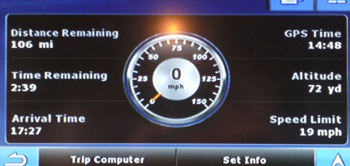 Let's liven things up a bit! - Page 1 - Evora - PistonHeads - The image appears to be a screenshot of a GPS tracking device, possibly a car's dashboard display screen, showing the current status of the vehicle's navigation system. On the screen, the major displayed portion is a speedometer with a needle pointing to zero miles per hour (0 mph), indicating that the vehicle is not in motion. Above the speedometer, there is information showing the current distance (106 miles) from the destination and the estimated time of arrival (2:39). To the left of the speedometer, newer technology options have been included, such as a "Set Info" button and a "Trip Computer" button, which suggests a more user-friendly and advanced feature set compared to traditional car dashboards. The phrase "TRIP COMPUTER" is clearly visible beneath the speedometer. The title "GPs Time 14:48" further implies that the GPS navigation system is active and providing the current time. Additionally, there is a note for speed limiting, indicating that the driver perhaps needs to adjust the speed limit ahead. On the top left of the screen, there is an arrow pointing left with a box stating "Navigation" over it, suggesting that the device is used primarily for GPS navigation