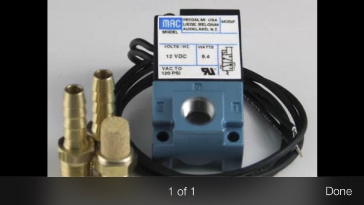 Boost solenoid filter - Page 1 - Noble - PistonHeads - The image shows a coil of black automotive wire with a label attached, containing various specifications and branding. In the foreground, two gold rods, also known as terminals or snubbers, are visible behind the spool of wire. In the background, another component labeled "MATTE N" is partially visible, suggesting it might be related to the coil. The overall style of the image is a straightforward product photograph with a focus on the branding and specifications of the items displayed.