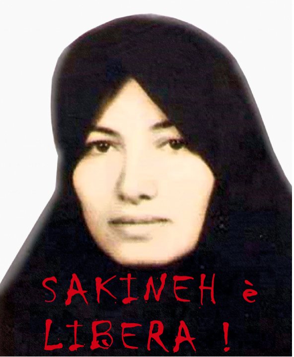 The image is a striking black and white portrait of a woman, her eyes shielded by her headscarf. The woman's gaze is direct and intense. Superimposed over her image are two pieces of text in red, one above and one below: "SAKINEH" and "LIBERA!", suggesting a political or social intent associated with the image.