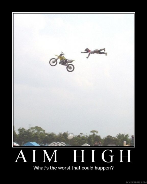 Pistonheads Funnies Tuesday - The image captures a high-energy moment of an environmental race event. In mid-air, two dirt bikes are airborne, with the bikers sitting upright. Their bodies are stretched out above the ground, evidencing the height of their jump. The jump has been framed with a black border, accentuating the action and drawing the eye to the daring maneuver. The text at the bottom of the image poses a humorous question about the competitiveness of the scene, inquiring about the riders' relative heights in measurements of at least one feet.