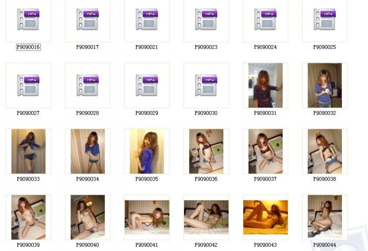 The image is a composite of multiple small photographs. Each photo features a different woman and a picture of what appears to be an iPod or mp3 player with a purple hue. The women are shown in various states of undress, with some posing and others in more intimate or provocative positions. The devices share a common design and color scheme, suggesting these photographs might be from an advertisement or promotional material for the music player. The photos are arranged in a grid, creating a structured visual flow across the frame. There is no visible text within the image that provides additional context or information.