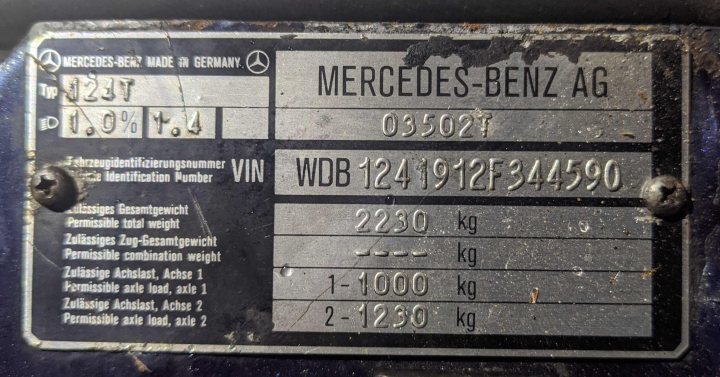 Titivating my Mercedes 124 - Page 86 - Readers' Cars - PistonHeads UK - The image shows a vehicle identification tag attached to the top of a car's windshield. The tag contains information about the vehicle, including the manufacturer, Mercedes-Benz, and the model, A-Class. Additionally, the tag displays a code, which seems to be an inventory or serial number, and some measurements and weights. The car appears to be parked in a location that has been marked as unauthorized for parking. The focus is on the tag, providing details about the vehicle's identification and specifications.