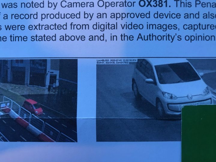 Penalty Charge Notice - questionable photographic evidence - Page 1 - Speed, Plod & the Law - PistonHeads - The image shows a notice on a camera operator's equipment. It appears to be a digital photograph of the camera equipment, which is likely mounted at an intersection or similar location for monitoring traffic. The text on the notice indicates that it was noted by camera operator ID 0x303 at time 15:46:24 on Thursday, April 17th. The content of the notice suggests that the device recorded images and video from a digital camera mounted above the intersection. The notice also mentions that there is an ongoing investigation related to a traffic violation, which includes capturing vehicle information and license plate numbers. In addition to the traffic-related investigation, it seems that there was a separate incident involving a person who entered the area below the camera. This could imply some sort of security or surveillance measure in place at this location.