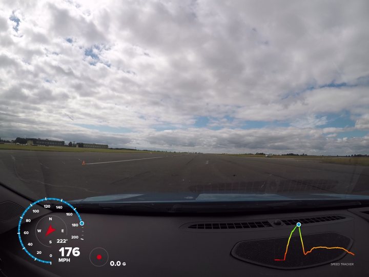 2017 Thunder Road info  - Page 6 - HSV & Monaro - PistonHeads - The image captures a view from a vehicle's dashcam, offering a continuous perspective from the left side of the front window, through the windshield, and displaying a digital display of a speedometer on the right side, showing the current speed as 176. The road ahead appears to be clear with a wide open landscape brightened by an overcast sky, suggesting it to be an open road or highway driving. The scene is devoid of any traffic congestion, giving the impression of a free-flowing journey in good weather conditions. The color palette of the image is a mix of the cool tones of a vehicle interior and the cooler colors of the sky, with the road exhibiting neutral greys.