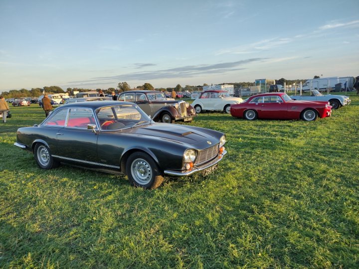 An old car is parked in a field - Pistonheads