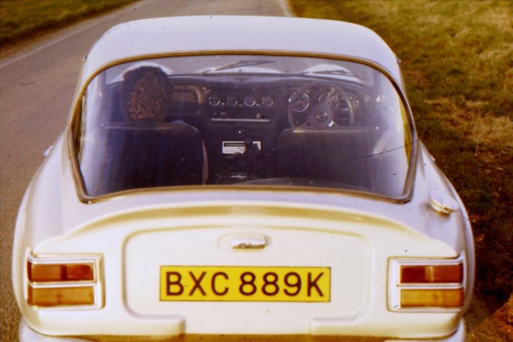 A close up of a car parked in a parking lot - Pistonheads