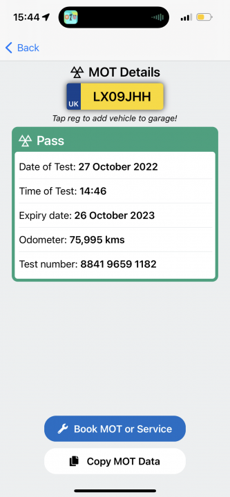 A close up of a person holding a pair of scissors - Pistonheads - The image shows a screenshot of a mobile device displaying a MOT (Ministry of Transport) details page with various pieces of information. At the top, there is a blue header that reads "MOT Details." Below this, there are fields for "LX8HJ" which stands for "License Number," followed by a field with the name "Test Vehicle 2021."

The date and time of the MOT test are indicated as 7.50 on October 6th, 2021. The location is shown as 7556 km from Guntur. The total distance traveled during the test is 89.93 kilometers, with a fuel efficiency of 89.93 liters per kilometer.

The screenshot also includes a small graphic at the bottom left corner that depicts a car and some text which reads "Book Mot Service." The image appears to be taken from an app or a mobile web page, as suggested by the navigation bar with a back button at the top of the screen.