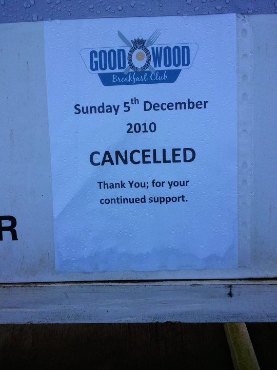 2012 Membership Packs - Page 1 - Goodwood Events - PistonHeads - The image shows a piece of paper with the words "GOOD WOOD BREAKFAST CLUB" printed at the top. Below this, the date "SUNDAY 5th DECEMBER 2010" is visible next to the words "CANCELLED" in bold, black font. There is a phrase of gratitude at the bottom, reading "THANK YOU; FOR YOUR CONTINUED SUPPORT." The text suggests that an event scheduled for December fifth, 2010, was cancelled at the Good Wood Breakfast Club.