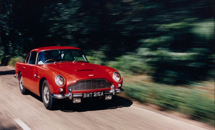 A red car is parked on the side of the road - Pistonheads