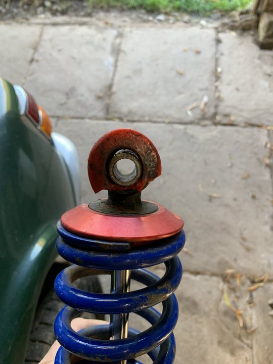A red fire hydrant with a chain attached to it - Pistonheads