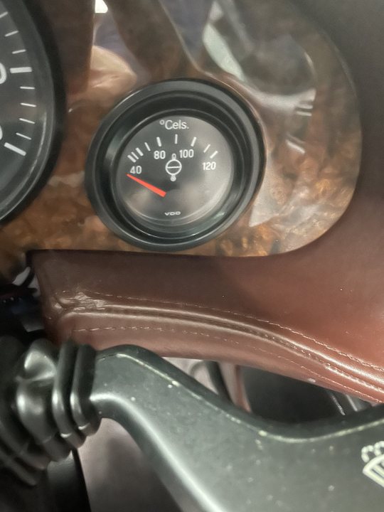 Water Temperature Gauge - Page 1 - Wedges - PistonHeads UK - The image shows a close-up of the dashboard of a car, with the focus on the speedometer and the fuel gauge. The needle on the speedometer is indicating that the vehicle is traveling at 60 miles per hour (mph). The temperature gauge is positioned in the center, suggesting it's at room temperature. On the left side of the dashboard, there's a small display screen which likely shows the odometer and possibly other car information. The fuel gauge is to the right of the speedometer, showing that the tank is nearly full.