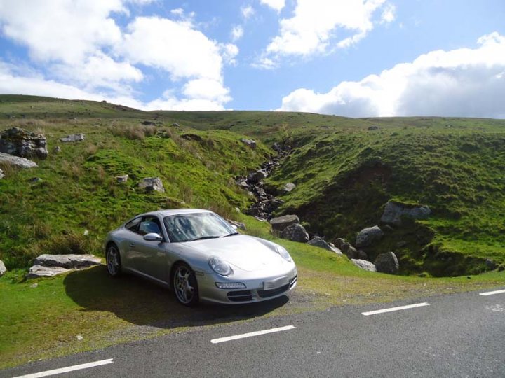 A car is parked on the side of a road - Pistonheads