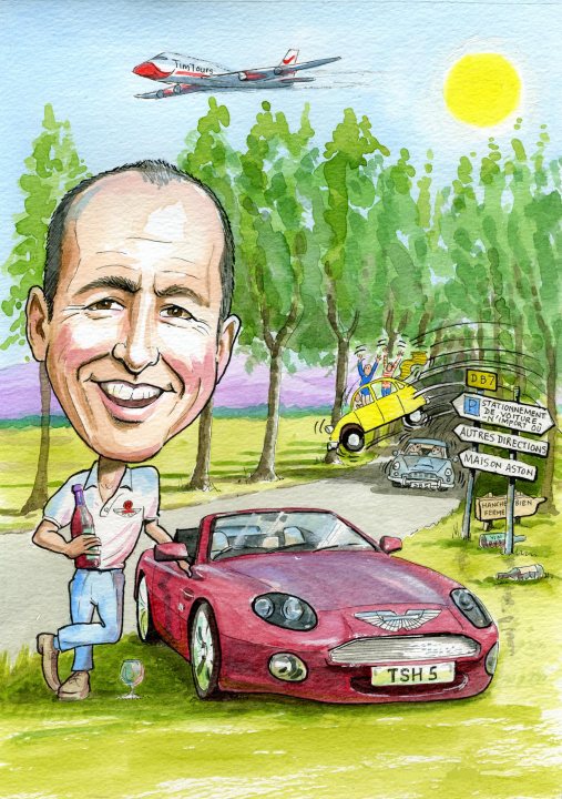 Pistonheads - The image is an illustration of a cartoon man standing next to a stunning luxury car, specifically a convertible Aston Martin DB7, identified by a license plate. The man is smiling and appears to be enjoying the moment. The car is parked on a grassy area with trees in the background, and there are indications of a busy road with various vehicles and a blurred airplane taking off in the sky. The presence of a large sign that says "TSH 5" and another that reads "Aston Martin" suggests this might be at an automotive event.