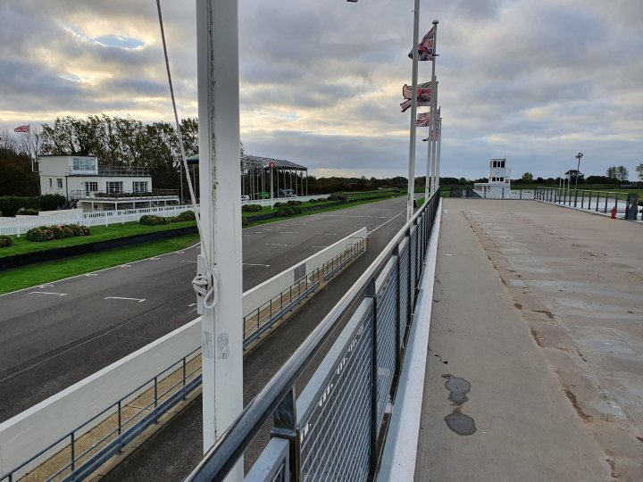 Fiesta ST MK7.5 Track car  - Page 33 - Readers' Cars - PistonHeads UK - The image captures a tranquil scene at a horse racing track. The track is wide and well-maintained, with no visible activity at the moment. Alongside it, there's a fence that separates the track from the spectator area, providing safety for both parties. 

A stand or seating area can be seen in the background, suggesting where spectators would sit to watch the races. The sky overhead is filled with clouds, casting a soft light over the scene. Despite the absence of horses or jockeys, the anticipation of an upcoming race seems palpable.