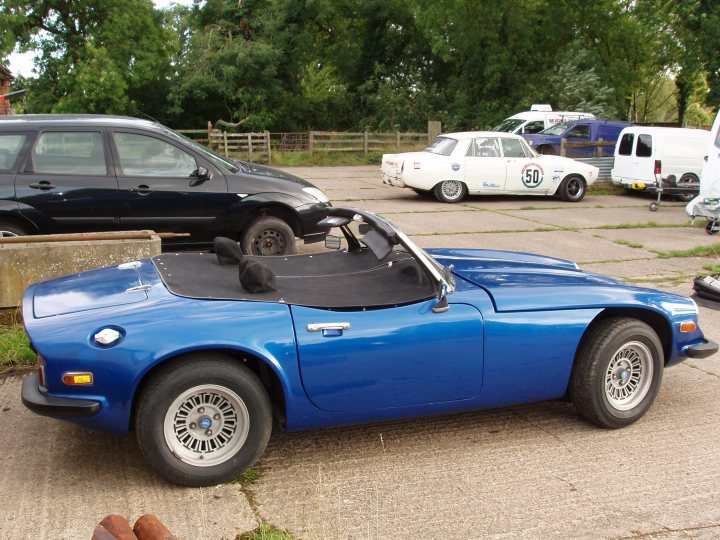 A car is parked in a parking lot - Pistonheads