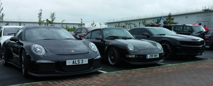 A car is parked on the side of the road - Pistonheads